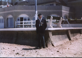 Len Butt standing at the approximate spot where he had Landed on D-Day